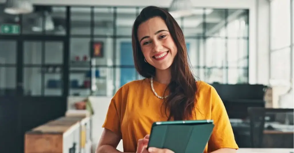 Business person holding a tablet computer Business person holding a tablet computer