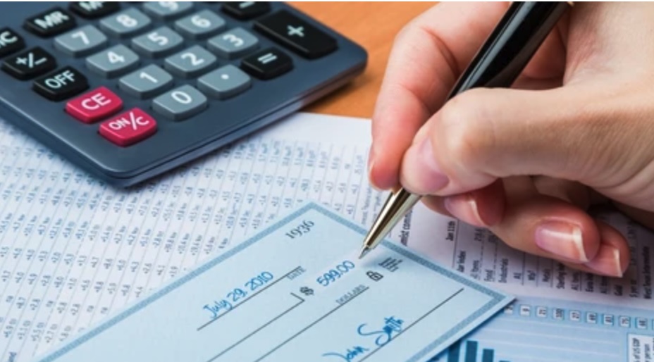 Hand writing a check