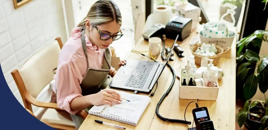 Contract services business person reviewing and entering data Contract services business person reviewing and entering data